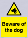 beware-of-the-dog-with-dog-warning-symbol~